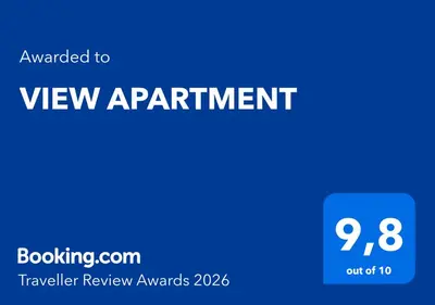 a blue sign with the text upgraded to view appointment at VIEW APARTMENT in Visoko