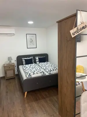 a bedroom with a bed in a room at Damade apartments in Jajce