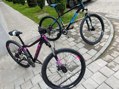 two bikes parked next to each other on a sidewalk at Platinum_Luxury_Apartment in Teslić