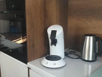 a white blender sitting on top of a counter at Holiday Home Libera in Bihać