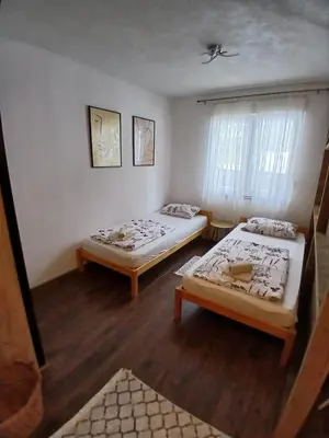a room with two beds and a window at Apartment View in Jajce