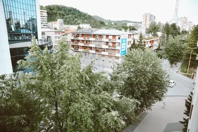 a view of a city with buildings and trees at Studio apartman NEI in Tuzla
