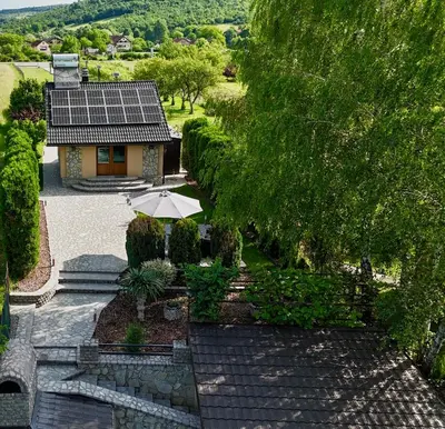 an aerial view of a house with a solar roof at Sunrise Guest House in Bihać