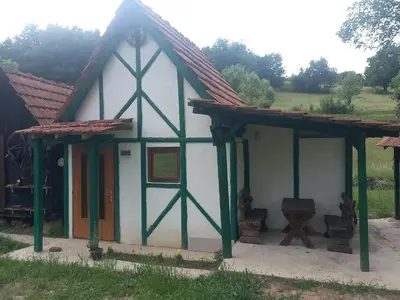 a small white house with a red roof at Kuća za odmor-Vikendica- in Visoko