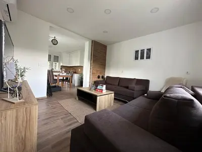 a living room with a couch and a table at Sara in Jajce
