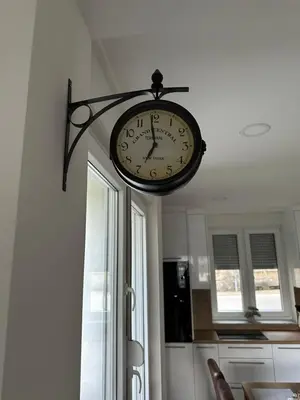 a clock hanging from the ceiling of a kitchen at Sara in Jajce