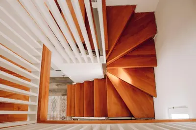 a large wooden wall with a staircase in a room at Weekend Joy Home in Visoko