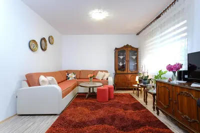 a living room with a couch and a table at The Cosmic Gate 3 in Biskupići