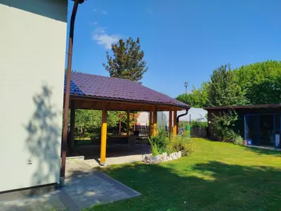 a gazebo in the yard of a house at Kuća za odmor V&E in Bihać