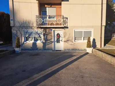 a house with a balcony on top of it at Apartman Ivo in Livno