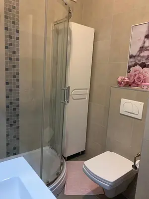 a bathroom with a shower and a toilet at Apartment Sweet Home Banja Luka in Banja Luka