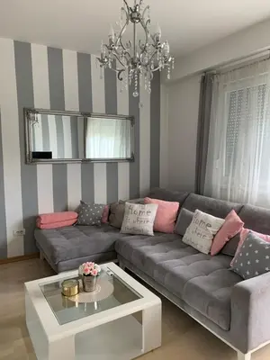 a living room with a couch and a table at Apartment Sweet Home Banja Luka in Banja Luka