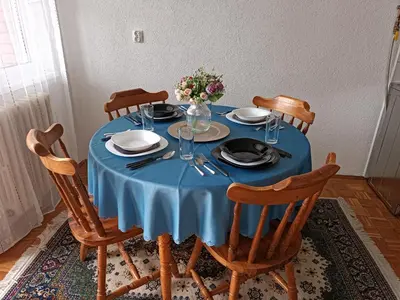 a blue table with chairs and a blue table cloth at Perfect Place in Visoko