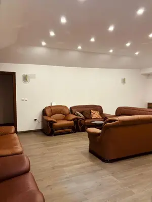 a living room with two couches and two chairs at Pool & Rest Holiday Home 3D in Bihać