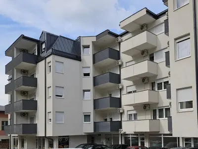 an apartment building with balconies on it at ADAV Luxus Apartment in Visoko