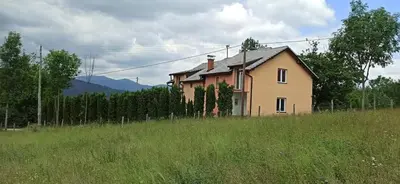 a house on a hill in a field at Vila Brdjanka in Šipovo