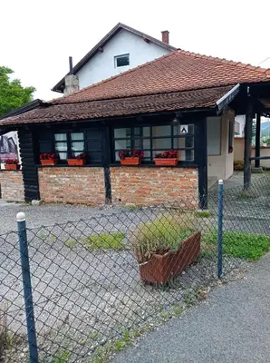 a house with a fence in front of it at Kuca za odmor Zlaja in Bihać