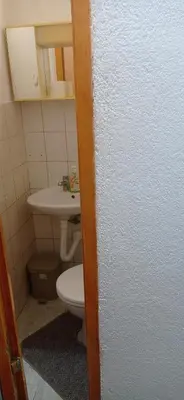 a bathroom with a toilet and a sink at Kuca za odmor Zlaja in Bihać