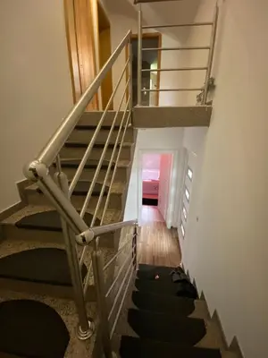 a staircase leading up to the second floor of a house at Rok in Tešanj