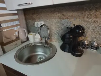 a kitchen counter with a sink and a mixer at DAMI 2 in Tuzla