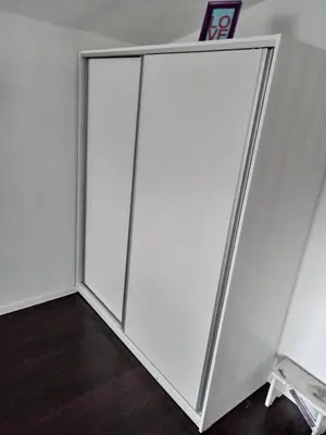 a white sliding door in a room at DAMI 2 in Tuzla