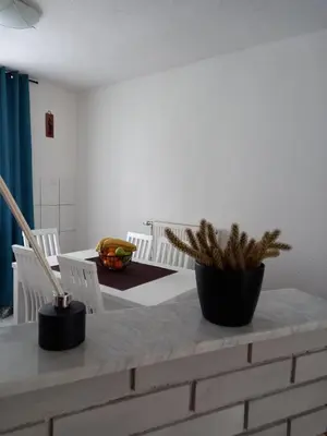 a dining room with a table and chairs at TerraNostra in Jajce