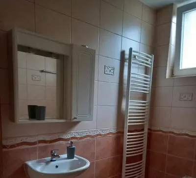 a bathroom with a sink and a mirror at TerraNostra in Jajce