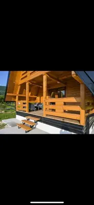 a building with wooden walls at Bungalow Jajce 2 in Jezero