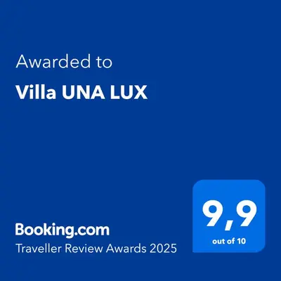 a blue text box with the words awarded to villa uniya uk at Villa UNA LUX in Bihać