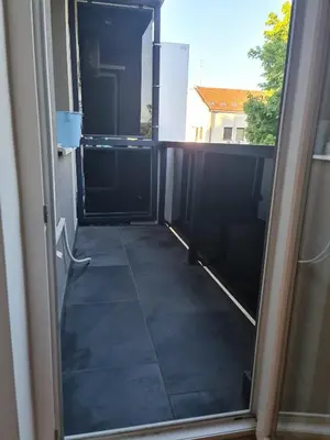 an open door to a room with a view at AGERA Apartments in Banja Luka