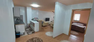 a small room with a kitchen and a bedroom at Apartman Citadel in Gradačac