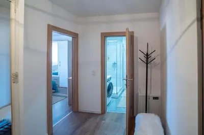 a hallway with a door leading to a bathroom at Apartman Niko in Livno