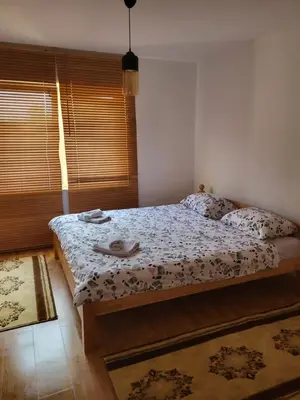 a bedroom with a bed and a window at Villa Harmony in Bihać
