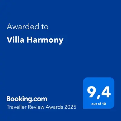 a blue text box with the words awarded to ville hamney at Villa Harmony in Bihać