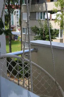 a view of a balcony with ropes at Blue Apartment in Bihać