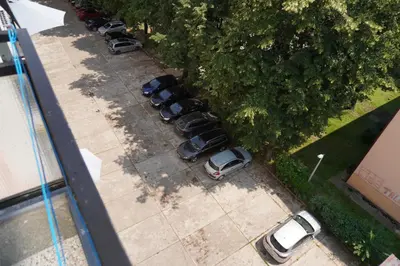 an overhead view of a parking lot with cars at Apartment Home Sweet Home in Banja Luka
