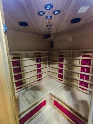 a large empty room with red windows and a ceiling at Apartman Magic Sauna,Jakuzzi,Kino in Livno
