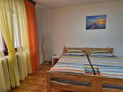 a bedroom with a bed in a room at City Center Stay in Visoko