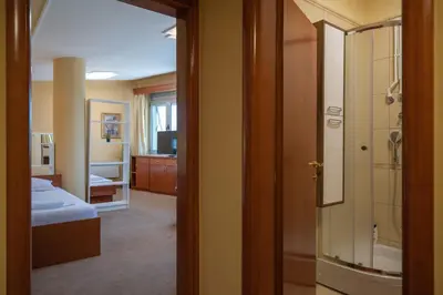a room with a bathroom with a sink and a mirror at Rio apartments in Banja Luka