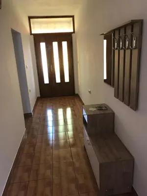 an empty room with a door and a wooden floor at Apartmani Golubina - Trn, Laktasi, BANJA LUKA in Grabljani