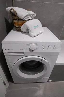 a washing machine with a basket on top of it at Apartman Ana in Banja Luka