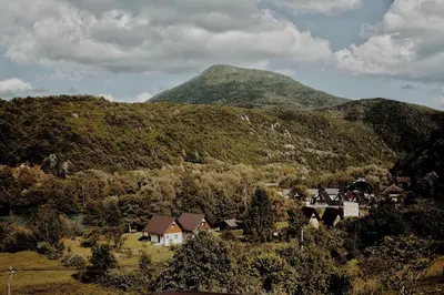a small village in a valley with a mountain at Holiday Home Casa Rondo in Bihać