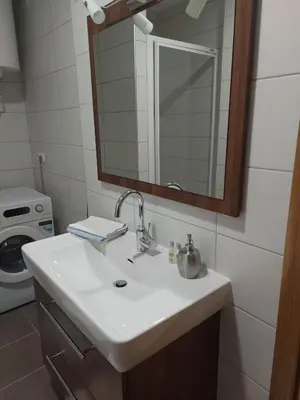 a bathroom with a sink and a mirror at Good Vibes in Bihać