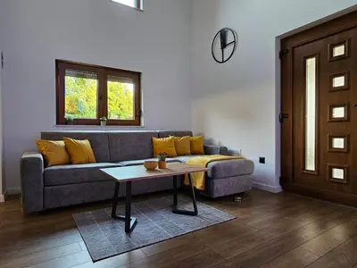 a living room with a couch and a table at Apartman Marin in Livno