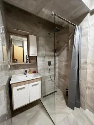 a bathroom with a shower and a sink at Apartman Paradise Fojnica in Fojnica