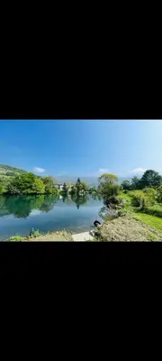 a view of a body of water with trees at Villa Pliva Oasis in Jezero