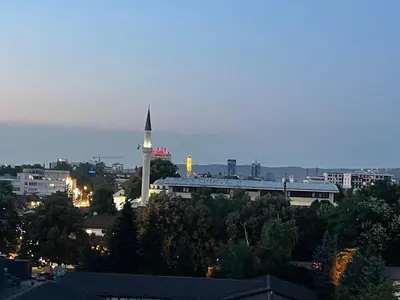 a view of a city with a clock tower at Amsterdam in Banja Luka
