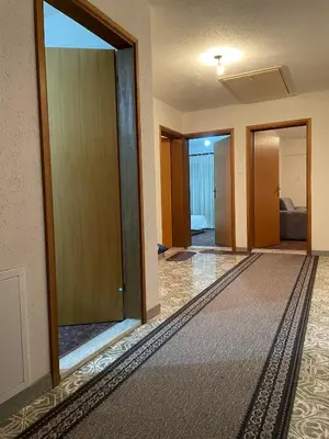 a room with a hallway with a large glass door at Pišta-pause in Bihać