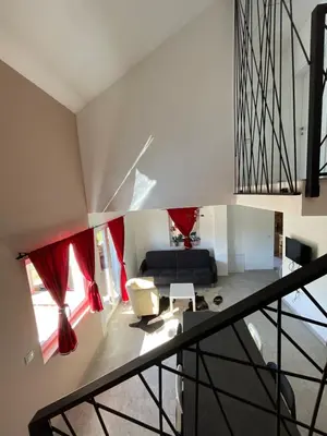 a view of a living room from the top of a house at Vikendica Villa Ramona Banja Luka in Banja Luka