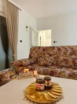 a living room with a couch and a plate on a table at Farmhouse Dženi in Vlasic